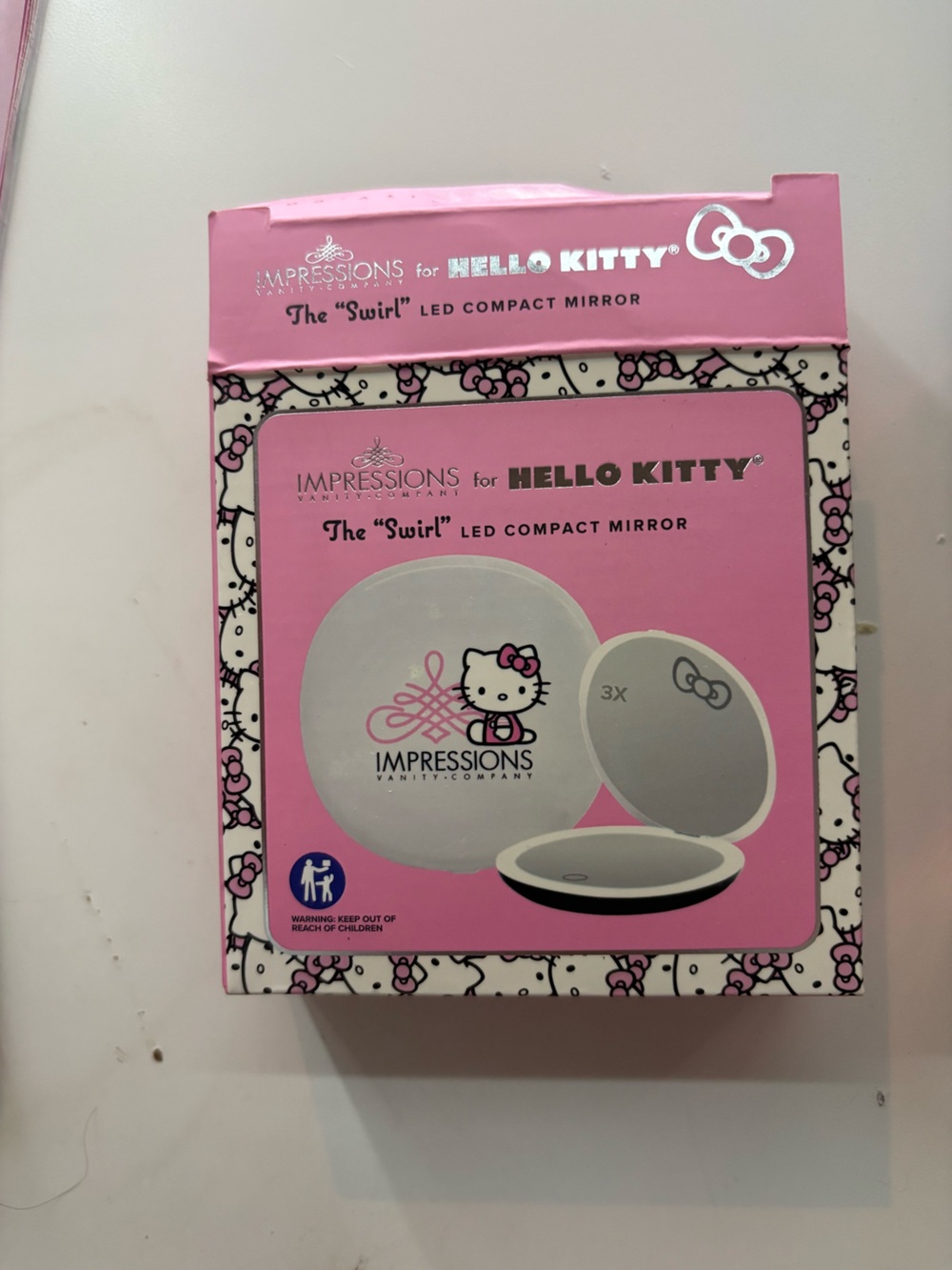 Impressions for Hello Kitty Pink LED Compact Mirror